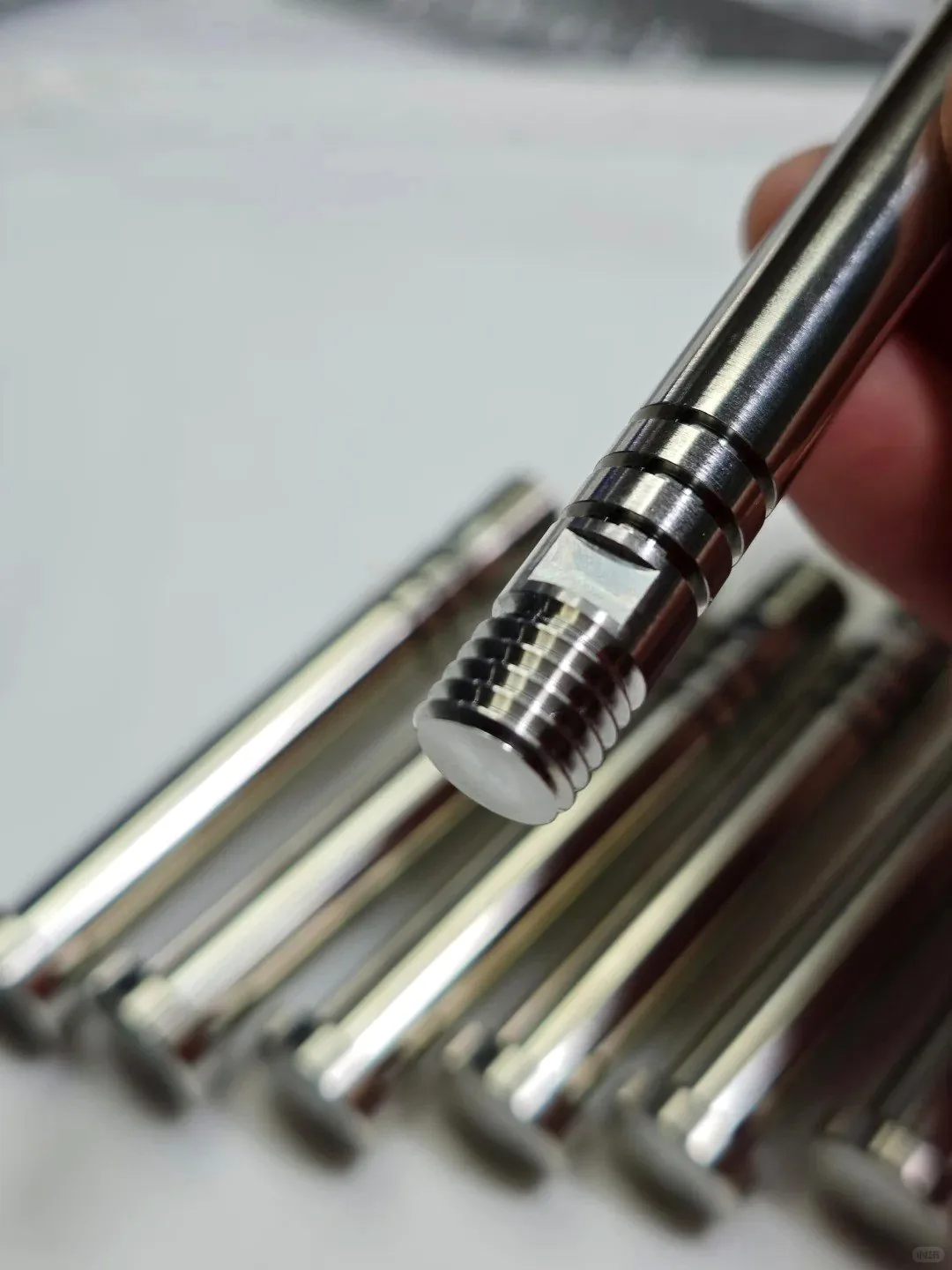Threaded Swiss machined precision shaft detail